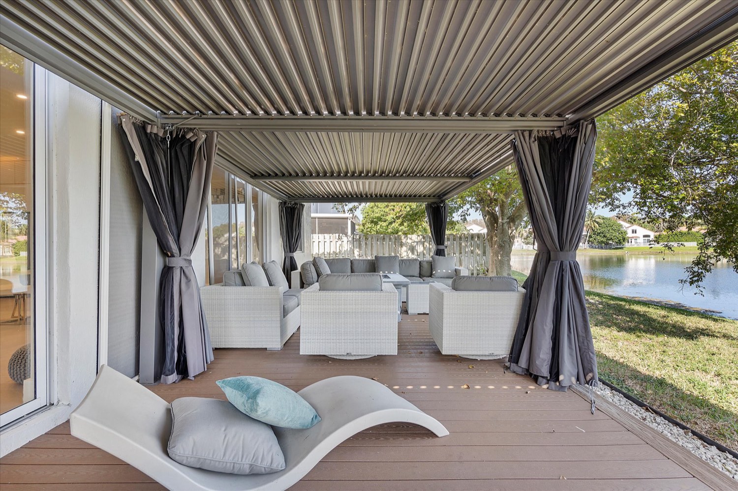 5312 SW 34 Way, Oakridge, Hollywood FL — the covered terrace looking out over the community lake